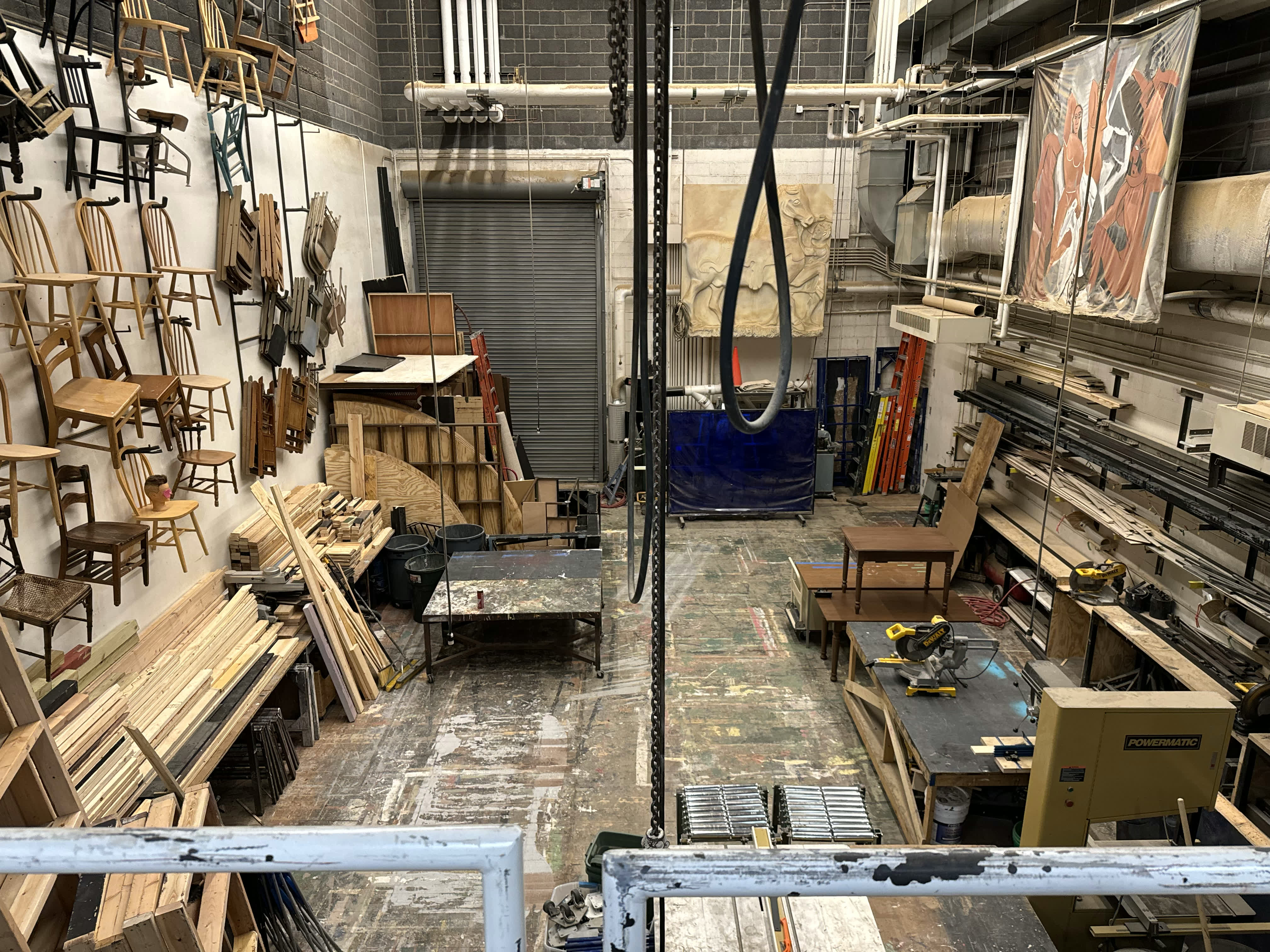 Woman with sunglasses walking down runway